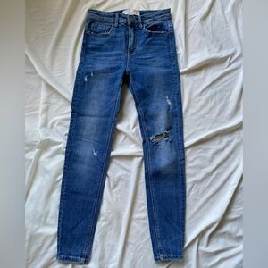 Stradivarius regular waist skinny jeans with rips